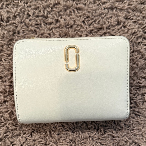Marc Jacobs Handbags - Marc Jacobs Ivory Wallet with Gold Accent